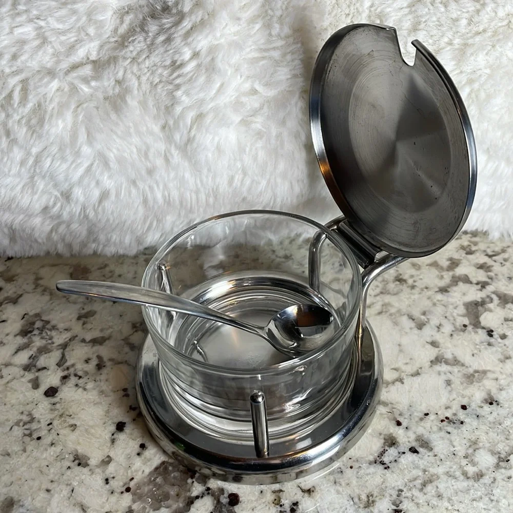 Vintage Parmesan cheese dish with spoon